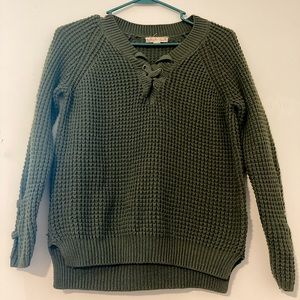 Green knitted sweater